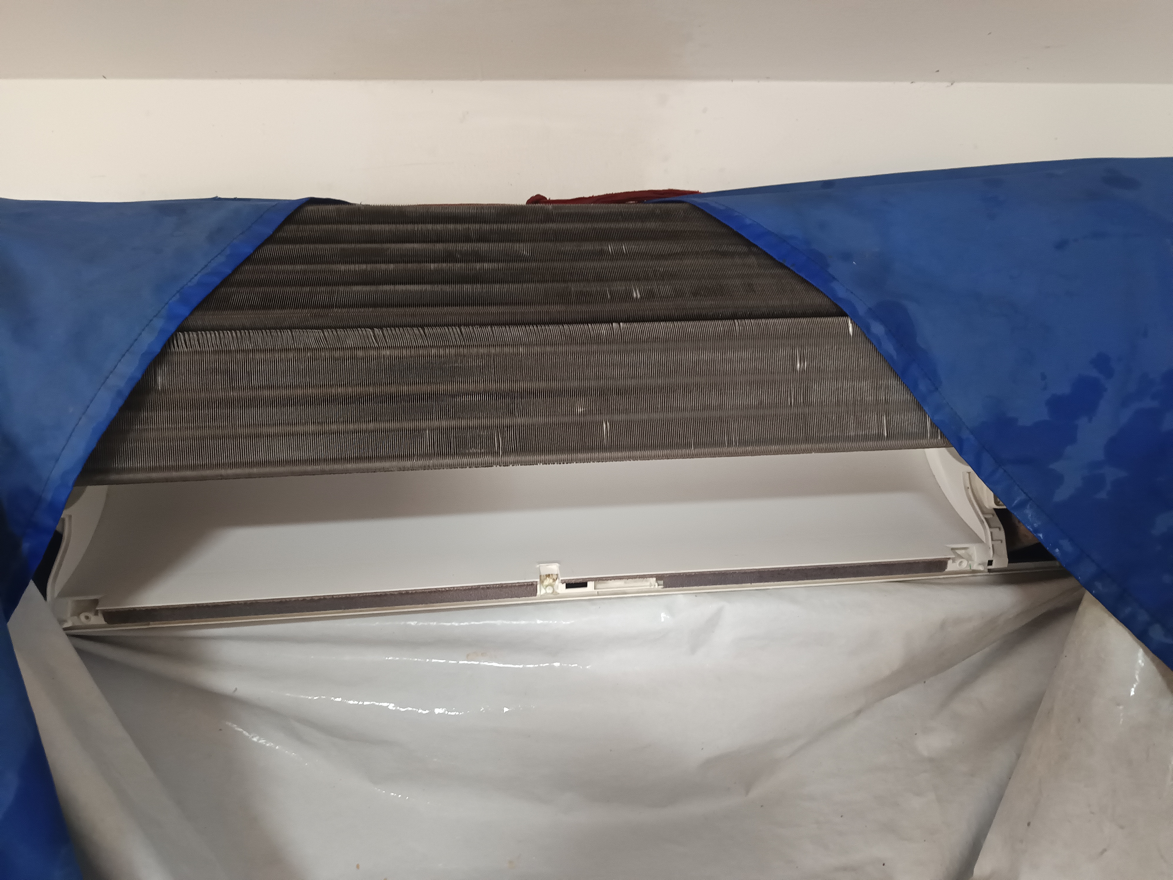 ล้างแอร์ในหมู่บ้านนราวัลย์วังน้อย